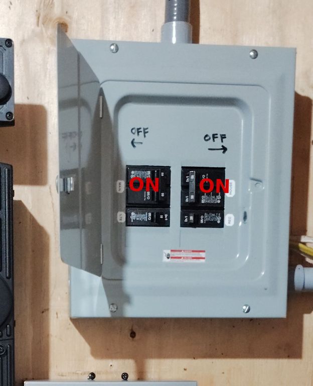 Pump House breaker positions to run the cabin from the pump house electrical system.